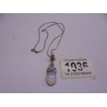 A silver pendant on silver chain, 6 grams.