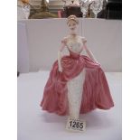 A Coalport figurine 'Millenium Debut' 4432/7500.