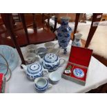 Blue and white Chinese teapots, soup bowls, spoons etc