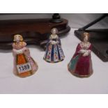 Three Royal Worcester candlesnuffers being Jane Seymour, Anne of Cleaves and Catherine of Aragon.