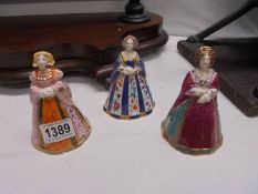 Three Royal Worcester candlesnuffers being Jane Seymour, Anne of Cleaves and Catherine of Aragon.