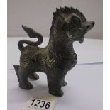 A bronze Dog of Foo, 13.5 cm tall.