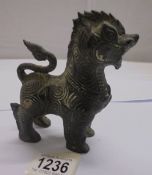 A bronze Dog of Foo, 13.5 cm tall.