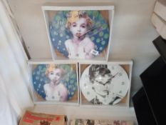2 Marilyn Monroe clocks and 1 Audrey Hepburn (all sealed)