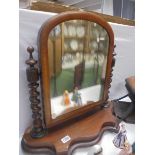 A Victorian mahogany toilet mirror with barley twist supports. COLLECT ONLY.