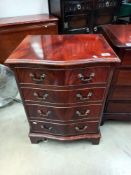 A 4 drawer dark wood chest COLLECT ONLY