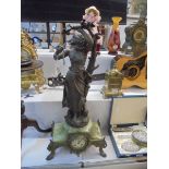 A 19th century French clock surmounted figure, 74 cm tall. COLLECT ONLY.