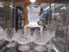 A cut glass jug, brandy goblets etc.,