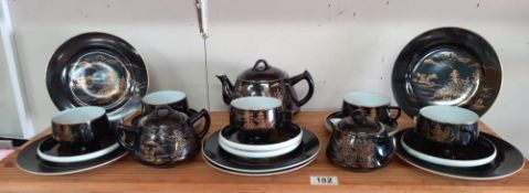 A vintage LGTC Japan black and gold tea set (missing 1 cup)