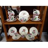 An Aynsley tea set, 6 cups and saucers, 4 tea plates