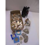 A mixed lot of coins includign UK, crowns, Victorian, world etc.,