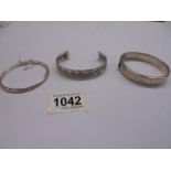 Three silver bangles, 51 grams.