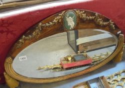 An oval Regency style mirror, 74 x 50 cm, COLLECT ONLY.