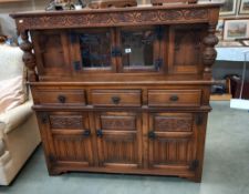A 1930/50's oak buffet with leaded glass panels COLLECT ONLY