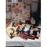 A quantity of Marilyn Monroe photos and photocards etc