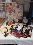 A quantity of Marilyn Monroe photos and photocards etc