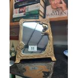 An art deco style brass framed mirror height 24cm, width 17.5cm