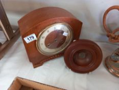 A 1930's oak mantle clock, no pendulum and a bowl made of teak from HMS Spartiate