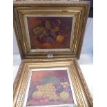 Two gilt framed still life paintings of fruit initialed A E B, 46.5 x 40 cm and 41 x 38 cm.