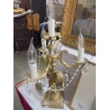 A candelabra style table lamp on cherub base, COLLECT ONLY.