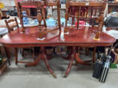 A dark wood stained 2 piece dining table with tip up tops for storage COLLECT ONLY