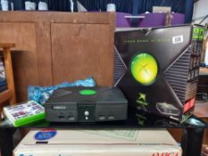 A boxed X Box video game system (untested)