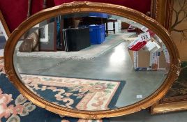 A vintage ormalu gilt framed oval bevel edged mirror COLLECT ONLY