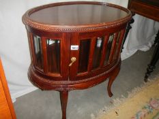 A contemporary mahogany display cabinet. COLLECT ONLY.