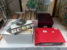 A large quantity of first day covers in boxes & an album COLLECT ONLY