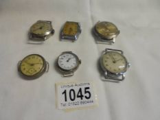 Six vintage watch heads for spare or repair,