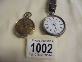 A silver fob watch a/f (no glass or minute hand) and a yellow metal fob watch.