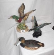 A Royal Doulton Duck and Blue Mountain and Akita examples