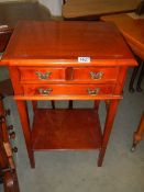 A mahogany side table with three drawers and string inlay, COLLECT ONLY.