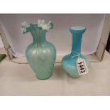 An antique blue satin glass vase, 17 cm tall and an antique blue satin glass vase, 15 cm tall.