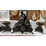 A fabulous 19th century black slate and bronze clock set with bronze statue of Shakespeare, both