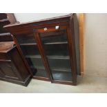 A Victorian/Edwardian mahogany glazed bookcase. COLLECT ONLY.