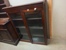 A Victorian/Edwardian mahogany glazed bookcase. COLLECT ONLY.