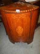 A Georgian mahogany inlaid barrel front corner cupboard, COLLECT ONLY.