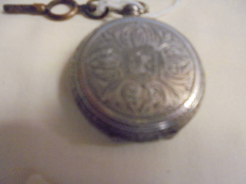 A ladies silver fob watch with key. - Image 3 of 3