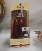 A boxed Bells millenium 2000 whisky
