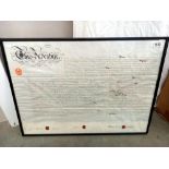 A good early framed and glazed stamped indenture