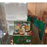 A boxed ENESCO Treasure Chest of Toys music box