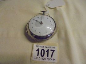 A silver pair-cased Verge, unsigned, silver dust cover, key wind pocket watch with 'Forget-Me-Not'