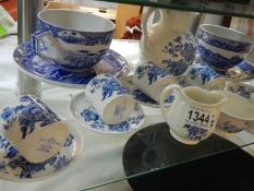 A quantity of Crown Devon blue and white china.