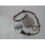 A Victorian chatelain chain together with a silver cased pocket watch.