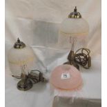 A pair of table lamps with beaded glass shades and a spare beaded shade