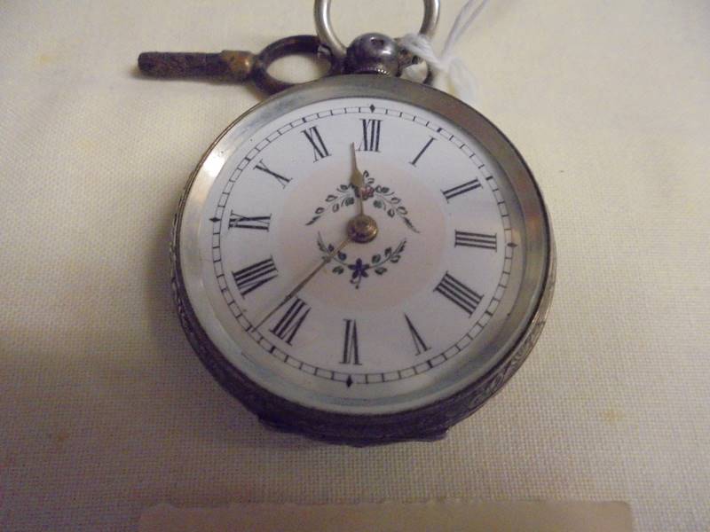 A ladies silver fob watch with key. - Image 2 of 3