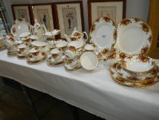 In excess of 50 pieces of Royal Albert Old country roses table ware (15 first quality, 44 second