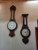 Two Edwardian aneroid oak barometers.