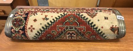 A large Edwardian brass foot warmer with original carpet covering.